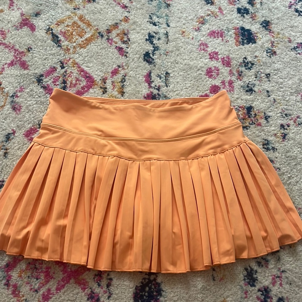 Orange Goldhinge tennis skirt